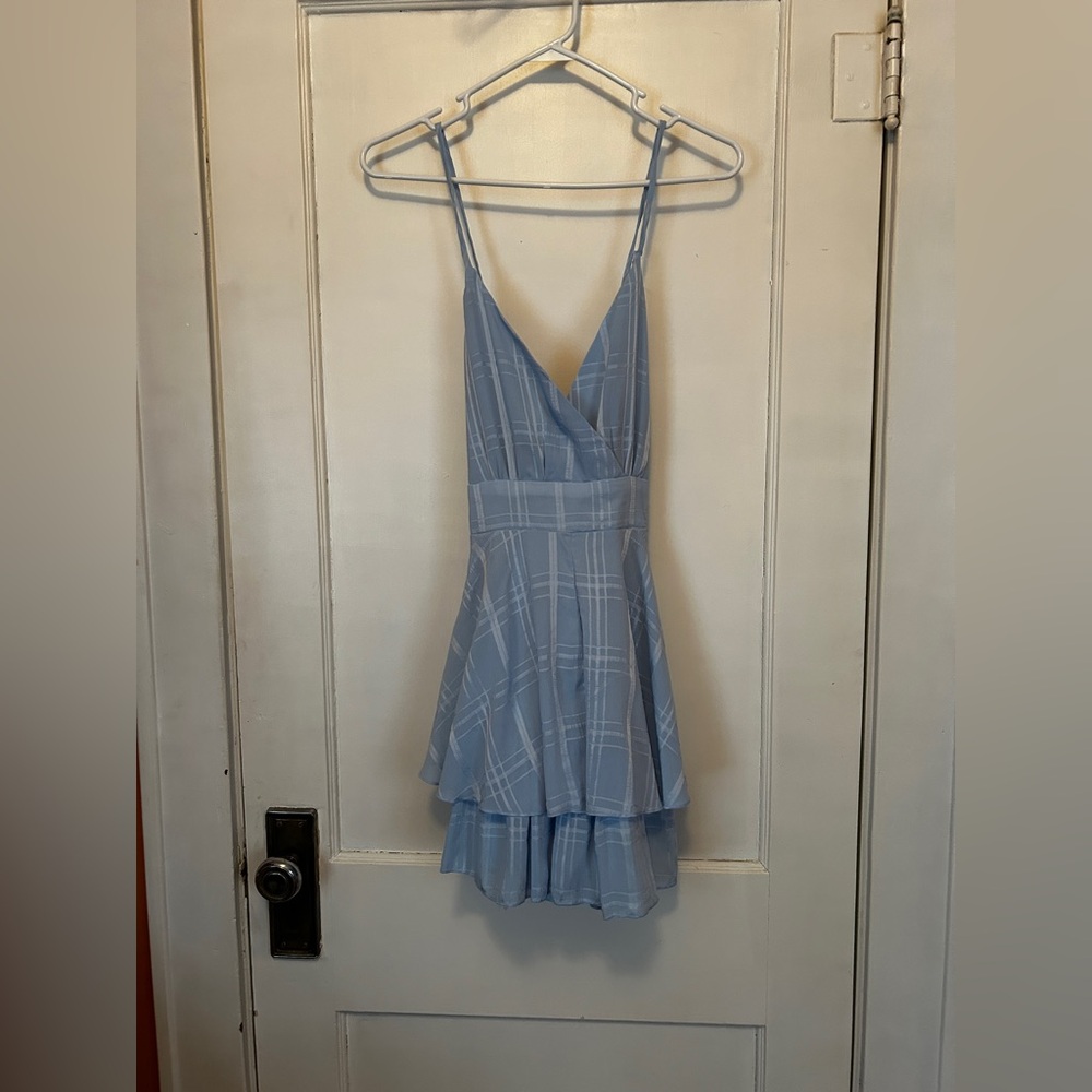 NWT Simplee Women’s light blue romper with ruffles and cross back - size medium